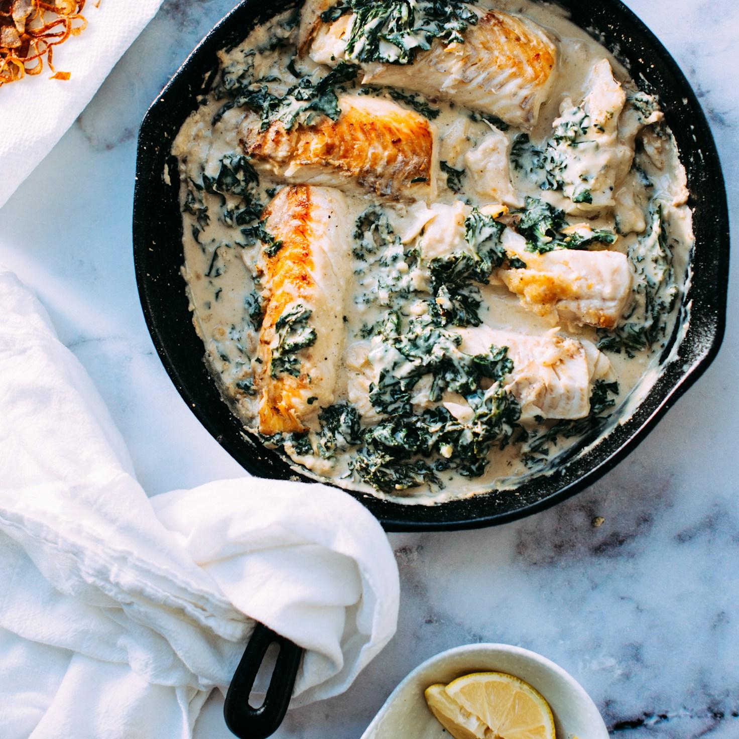 Community members collaborating in a modern kitchen space, sharing recipes and cooking techniques